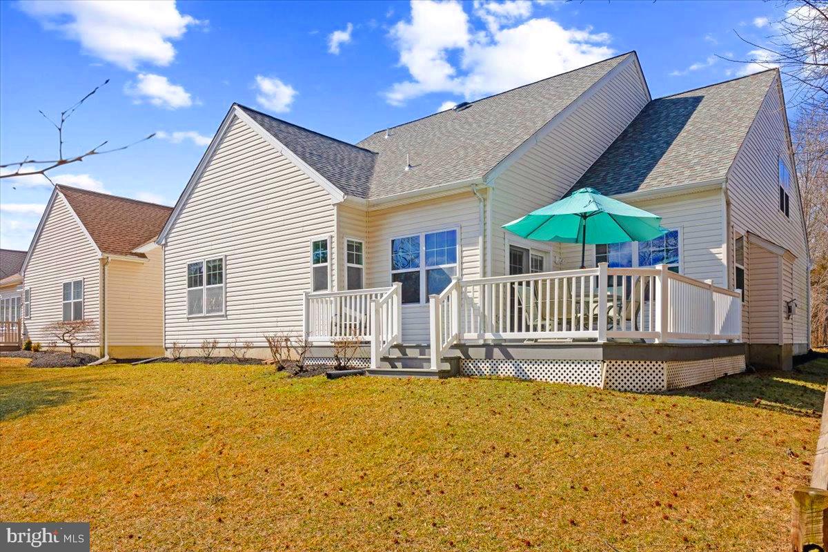 131 Lowell Drive Marlton, NJ 08053 - Photo 45 of 60 a view of a house with a yard patio and fire pit
