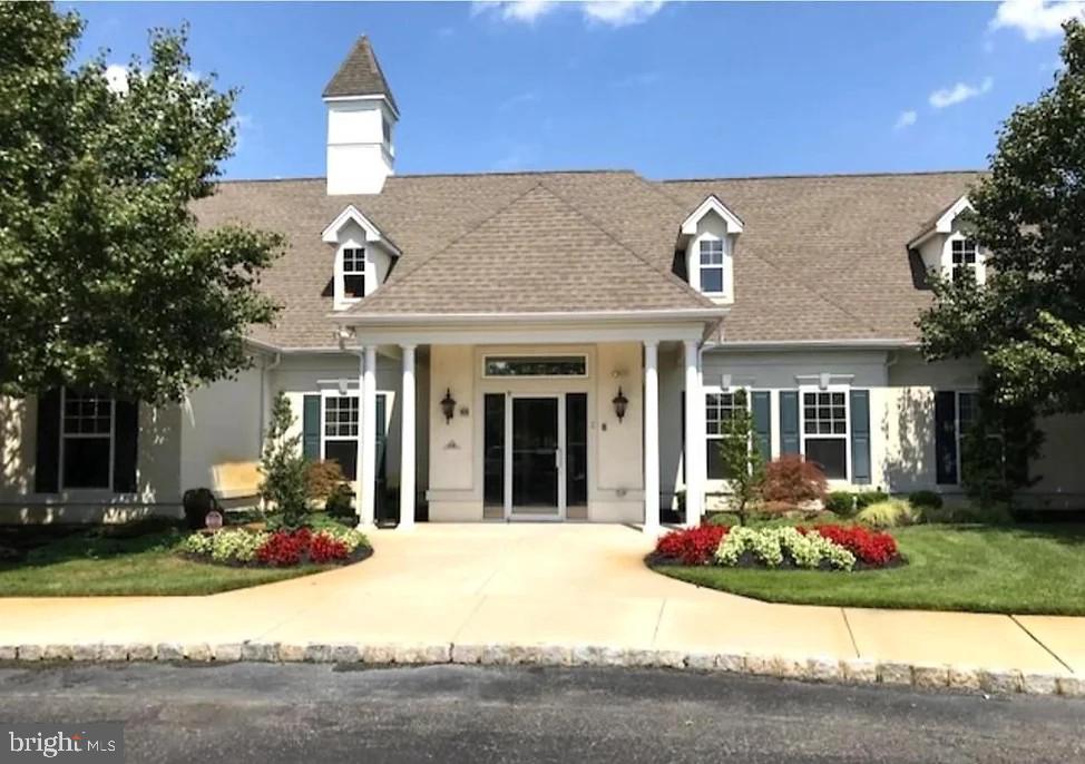 131 Lowell Drive Marlton, NJ 08053 - Photo 50 of 60 a front view of a house with garden