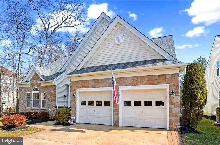 131 Lowell Drive Marlton, NJ 08053 - Photo 9 of 60 a view of a building with a yard