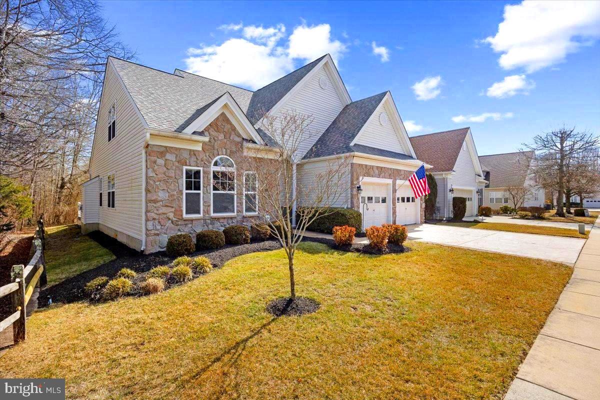 131 Lowell Drive Marlton, NJ 08053 - Photo 10 of 60 a view of a house with swimming pool and sitting area