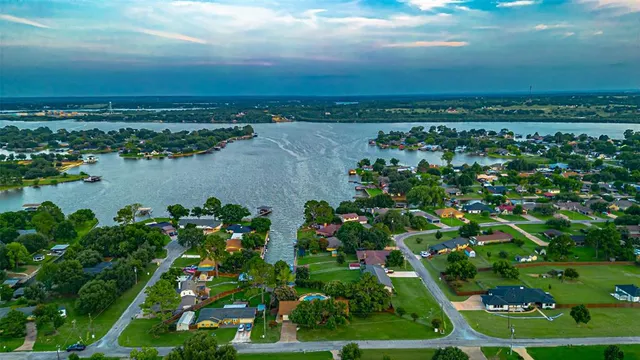 an aerial view of a houses with outdoor space