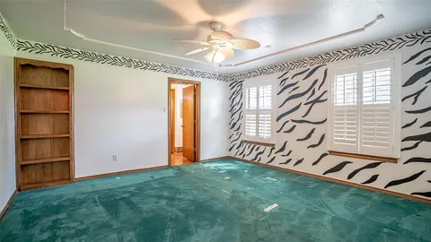 a view of a bathroom with a glass door