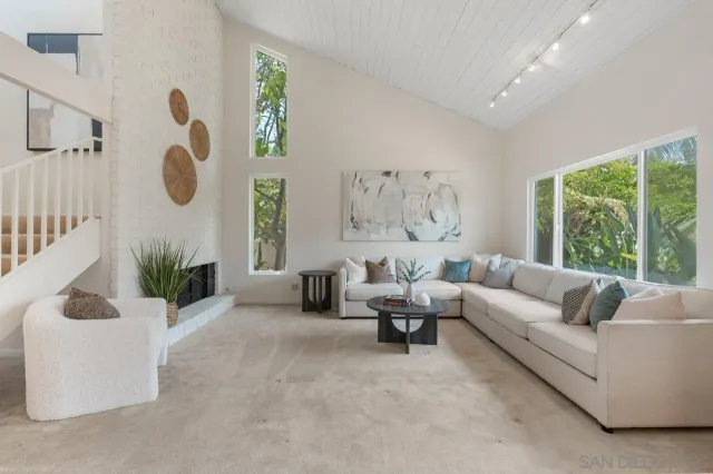 a bathroom with a sink toilet and mirror