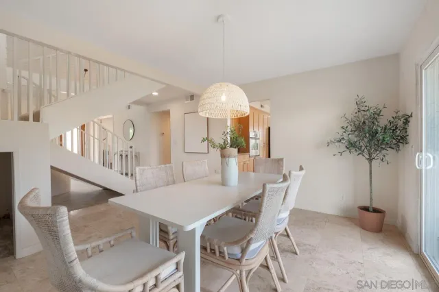 a balcony with wooden floor and fence