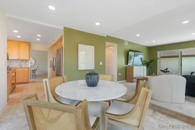 a bed room with a bed and a large window