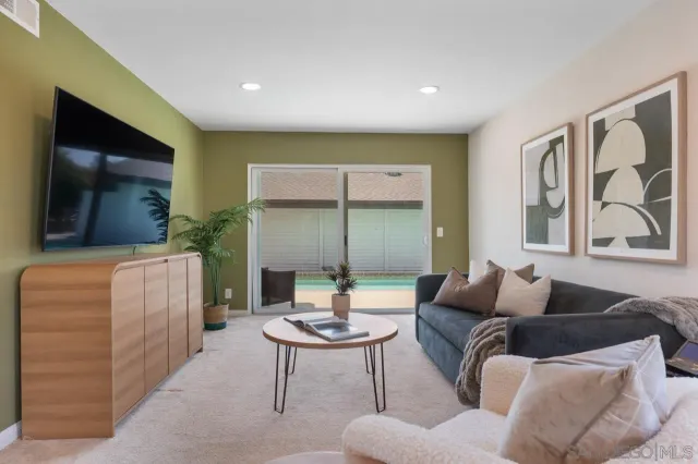 a view of a house with a yard porch and sitting area