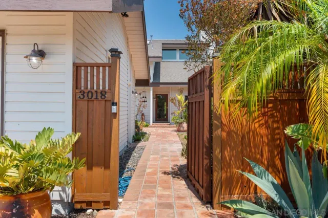 a view of a house with swimming pool patio and porch
