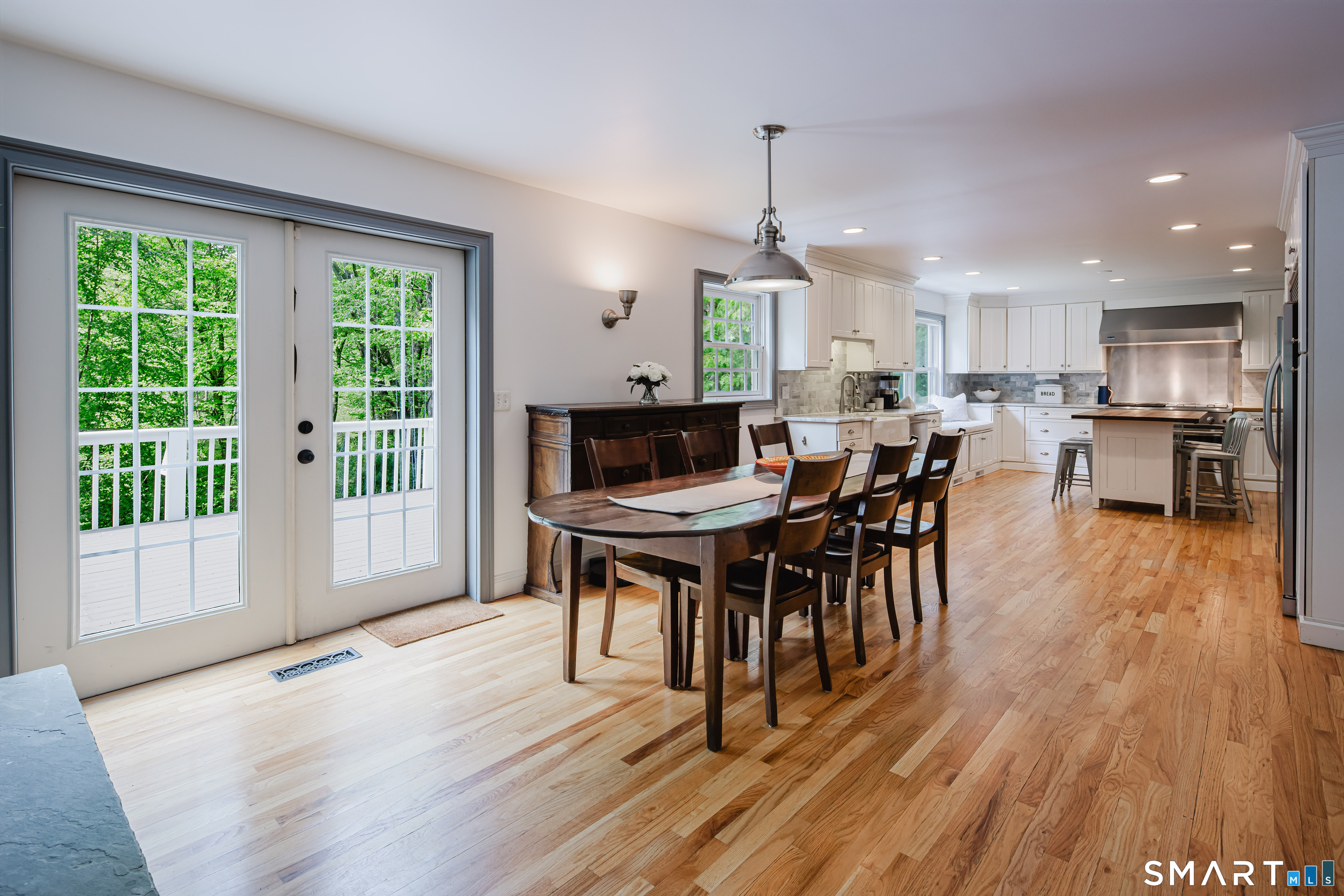 3 Partridge Trail Sherman, CT 06784 - Photo 15 of 37 a view of a dining room with furniture and wooden floor