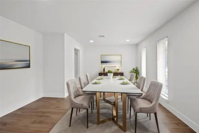 a view of a dining room with furniture