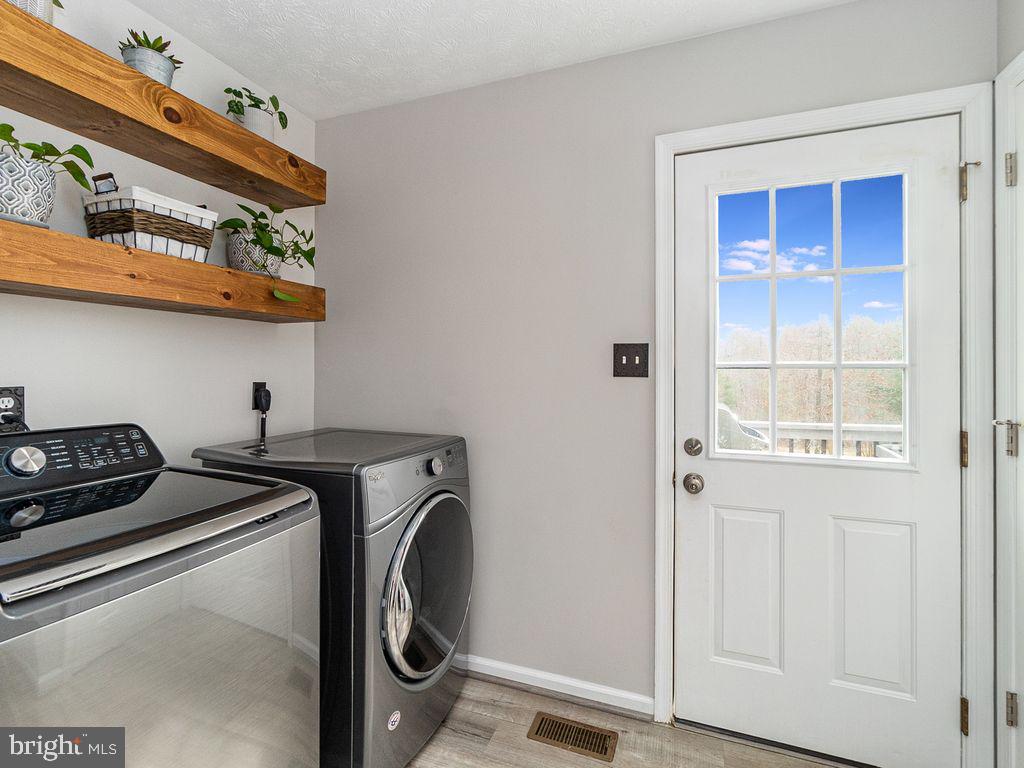10411 Hidden Lake Lane Rixeyville, VA 22737 - Photo 13 of 35 Laundry Room