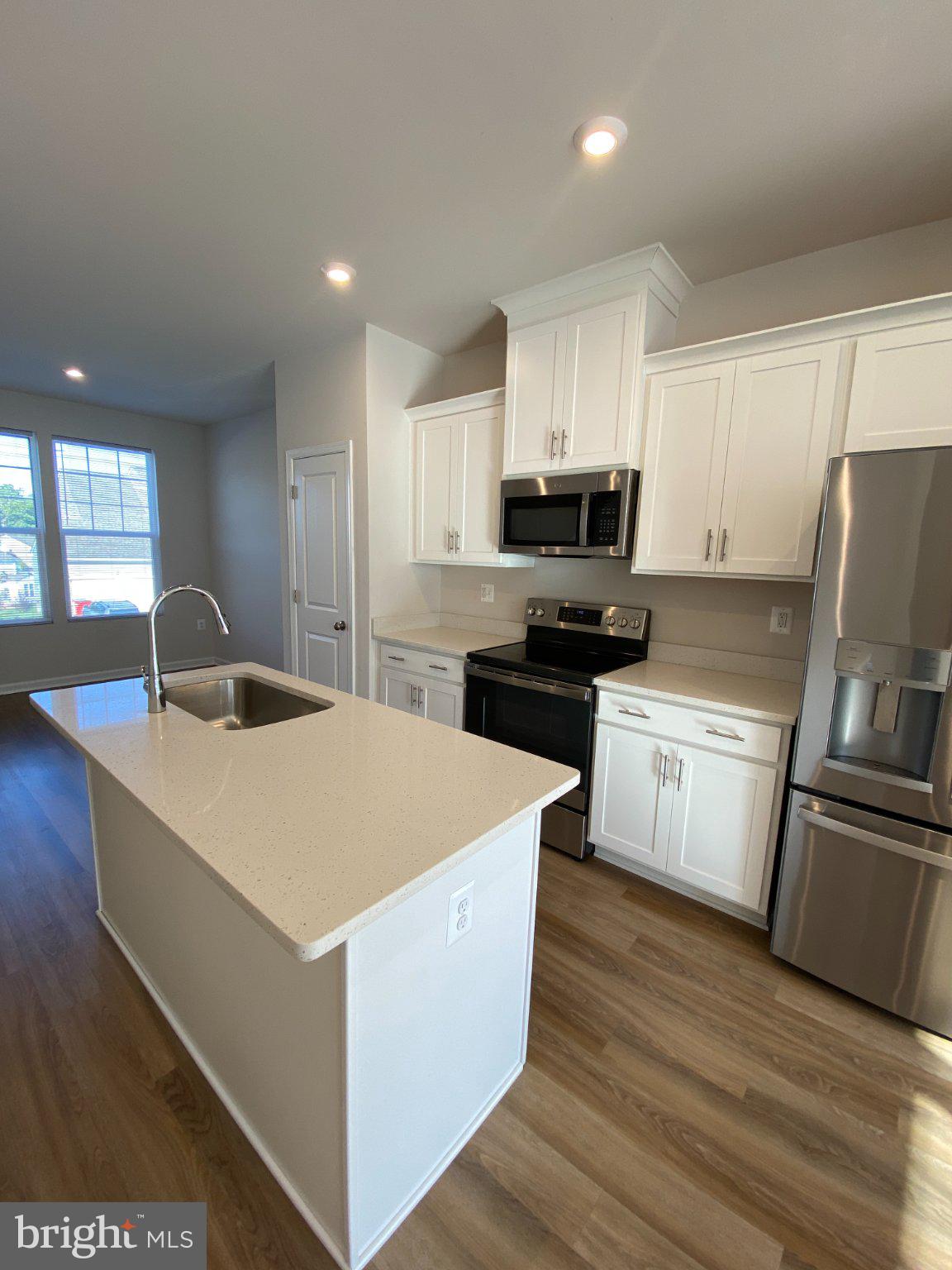 58 Coolidge Avenue Ranson, WV 25438 - Photo 8 of 30 Modern kitchen with sleek finishes.