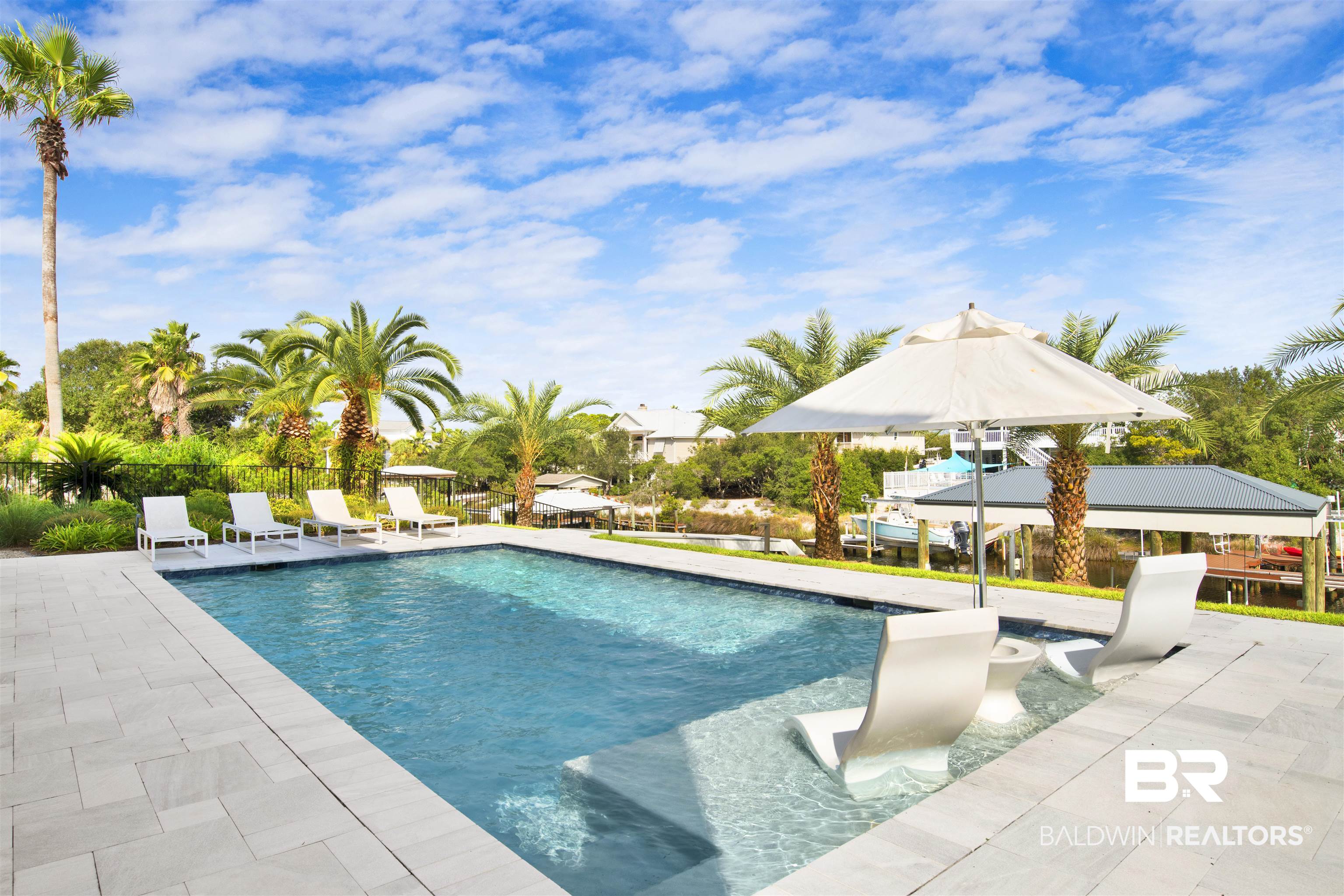30239 Canal Court Orange Beach, AL 36561 - Photo 64 of 70 Outdoor pool featuring a patio