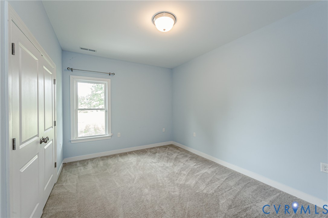 2018 Valentine Road Henrico, VA 23228 - Photo 30 of 65 an empty room with windows