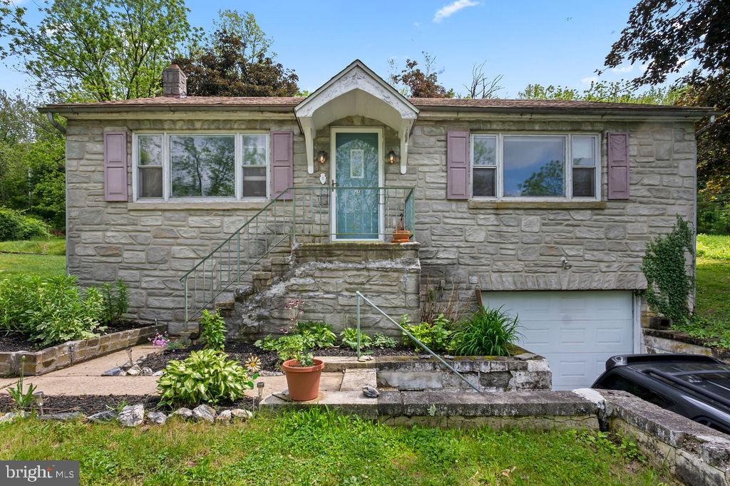 1644 Moselem Spring Road Hamburg, PA 19526 - Photo 1 of 26 Charming stone home with lush greenery.