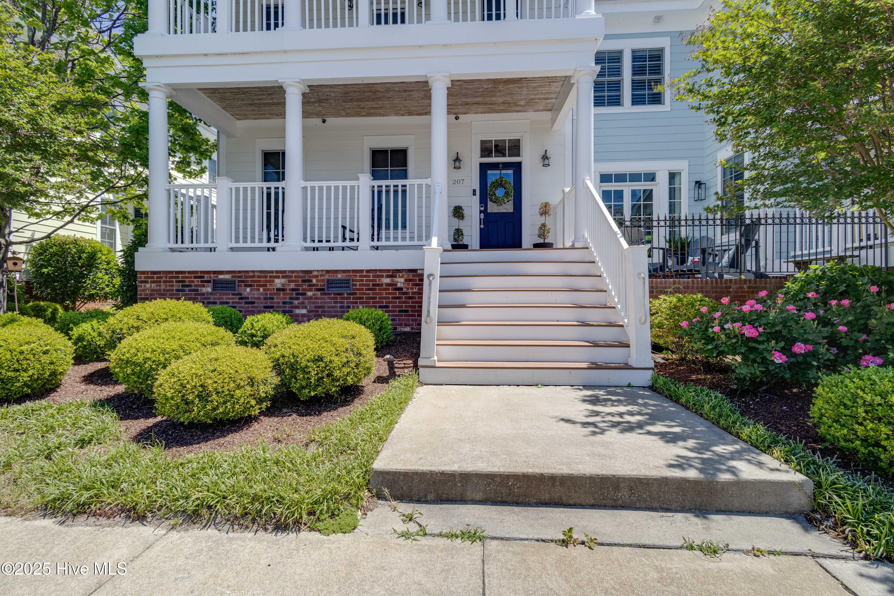 207 South Academy Street Washington, NC 27889 - Photo 3 of 42 Park right at your front door, or make your way around back to your two-car garage.
