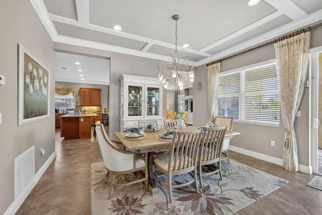 a kitchen with stainless steel appliances granite countertop a stove top oven a sink dishwasher and cabinets