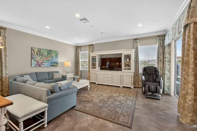 a bedroom with a bed and a mirror