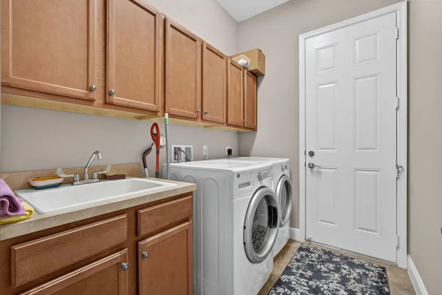 a bedroom with a bed and a cabinets