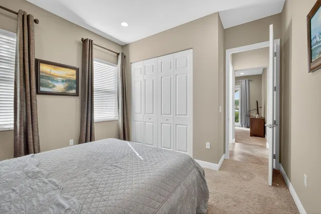 a view of a swimming pool and a yard