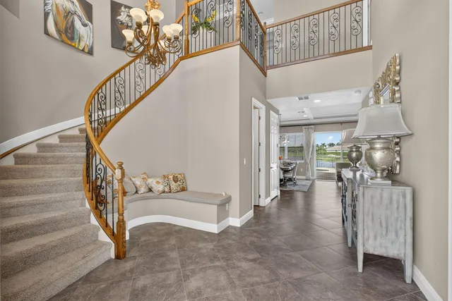 a bathroom with a sink a mirror and a vanity