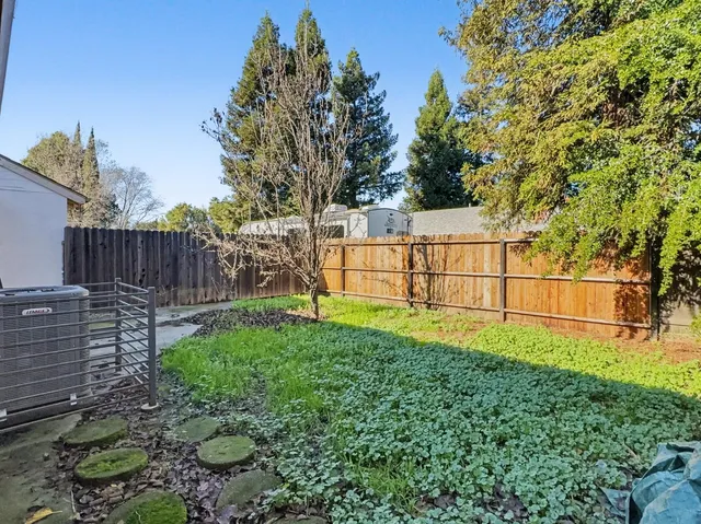 a view of backyard with green space