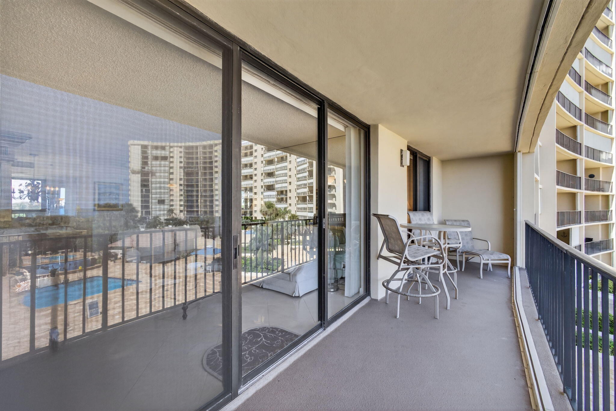 100 Ocean Trail Way, Unit 305 Jupiter, FL 33477 - Photo 28 of 90 a dining room with furniture and a floor to ceiling window