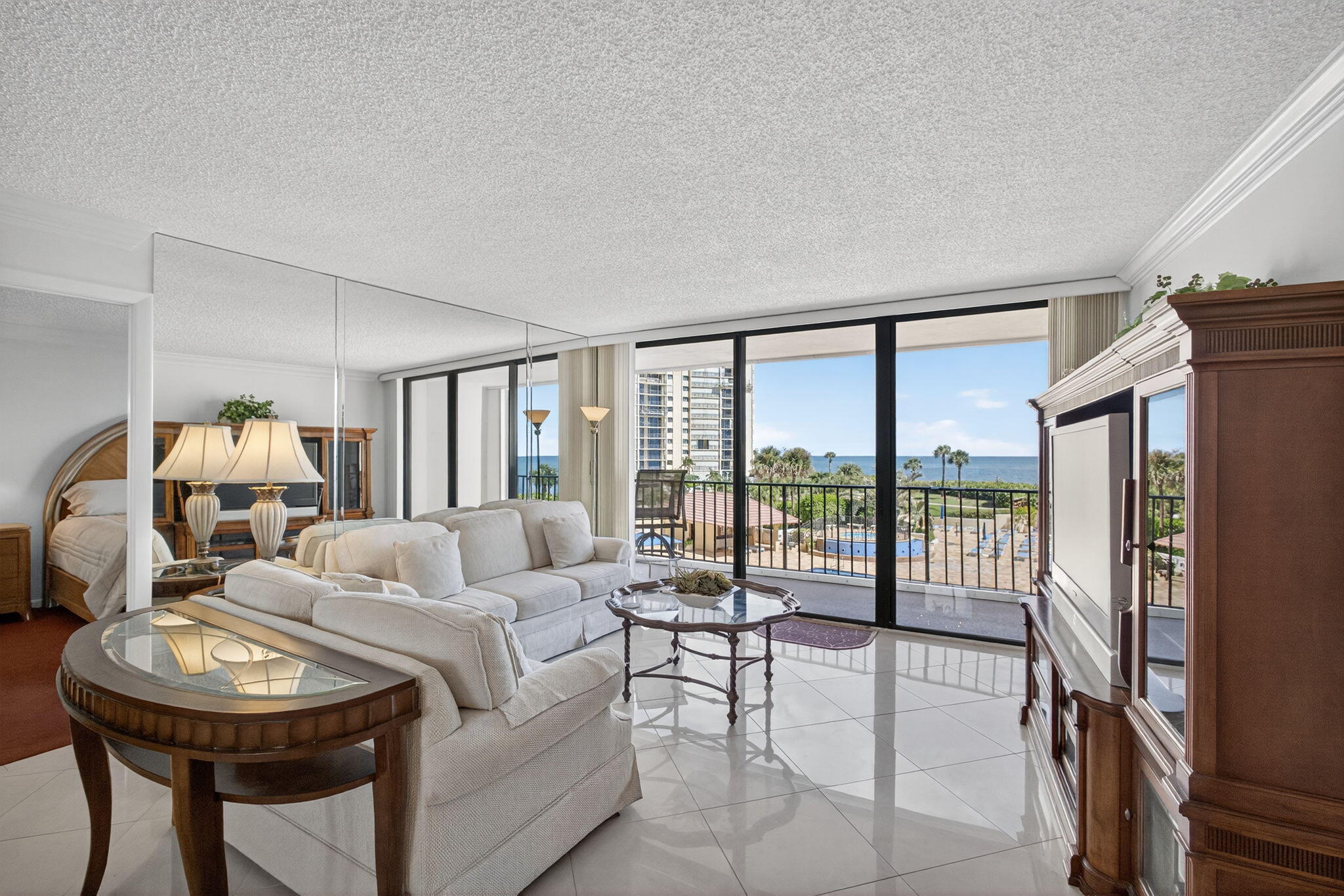 100 Ocean Trail Way, Unit 305 Jupiter, FL 33477 - Photo 4 of 90 a living room with furniture and a large window