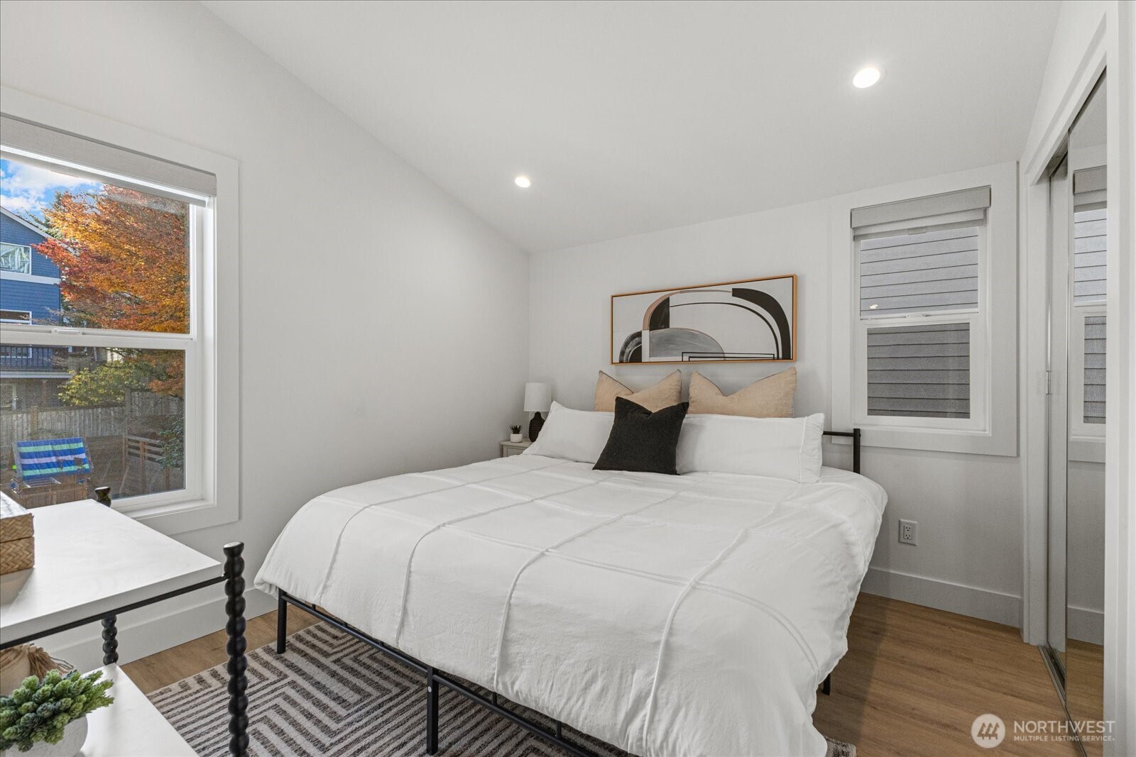 3537 Northeast 93rd Street Seattle, WA 98115 - Photo 13 of 22 a bedroom with a bed and window