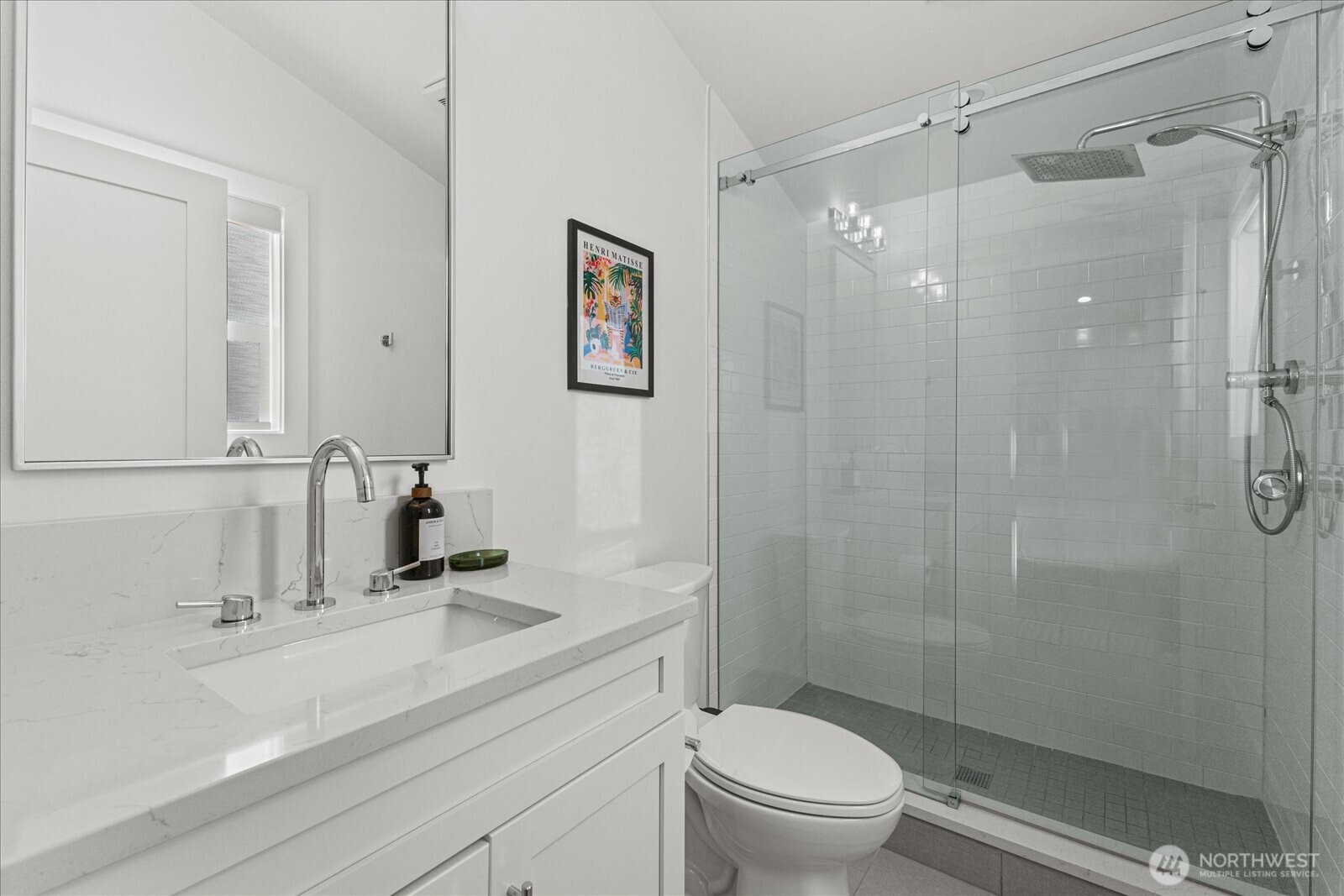 3537 Northeast 93rd Street Seattle, WA 98115 - Photo 14 of 22 a bathroom with a sink a toilet and shower