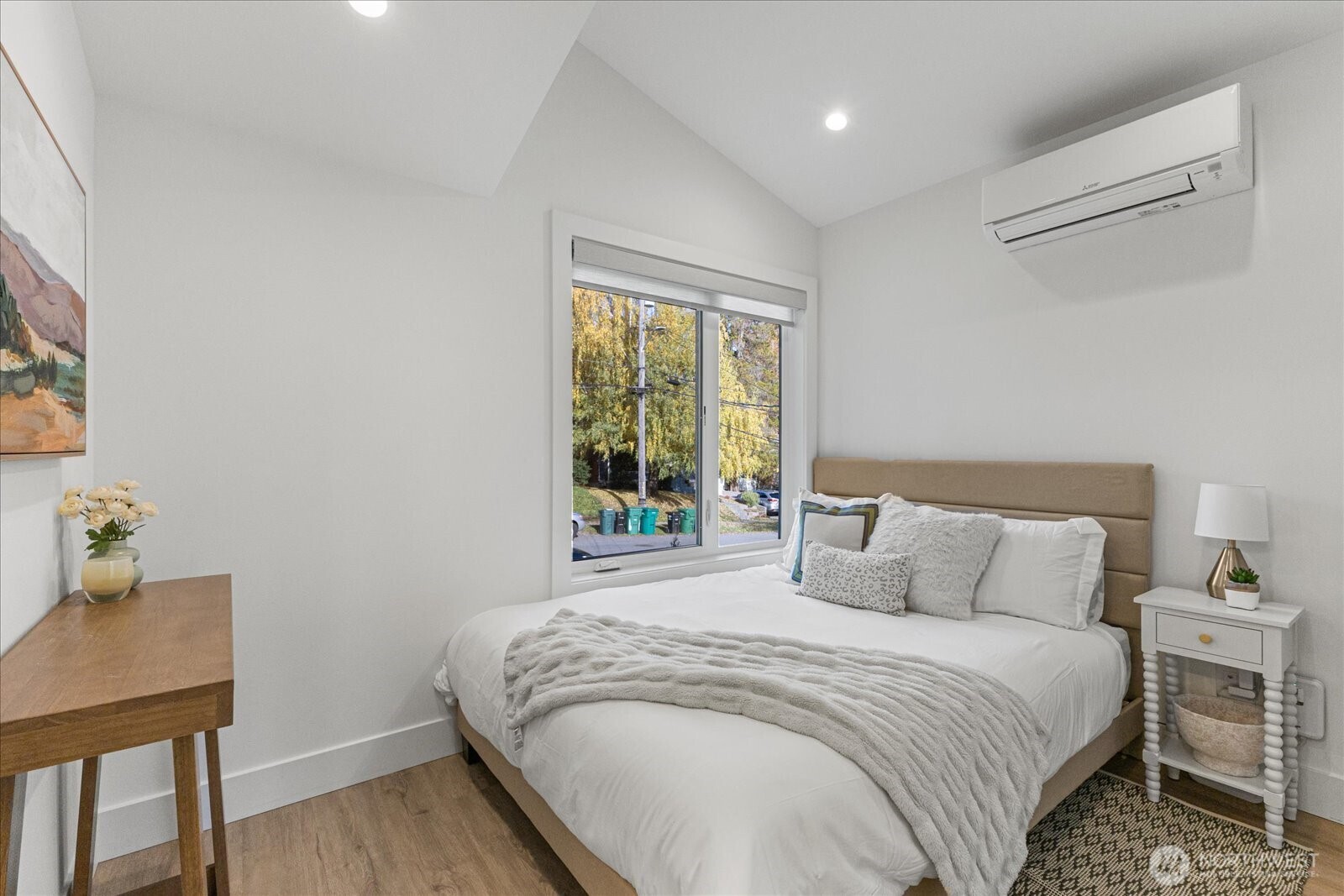 3537 Northeast 93rd Street Seattle, WA 98115 - Photo 16 of 22 a bedroom with a bed and a table in it