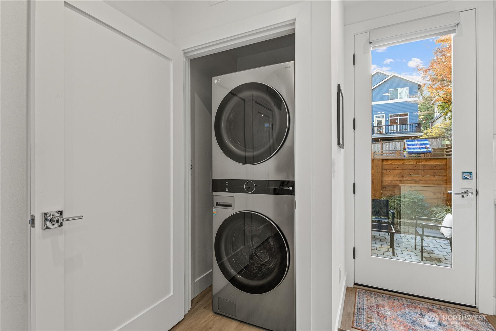3537 Northeast 93rd Street Seattle, WA 98115 - Photo 19 of 22 a view of a hallway with washer and dryer