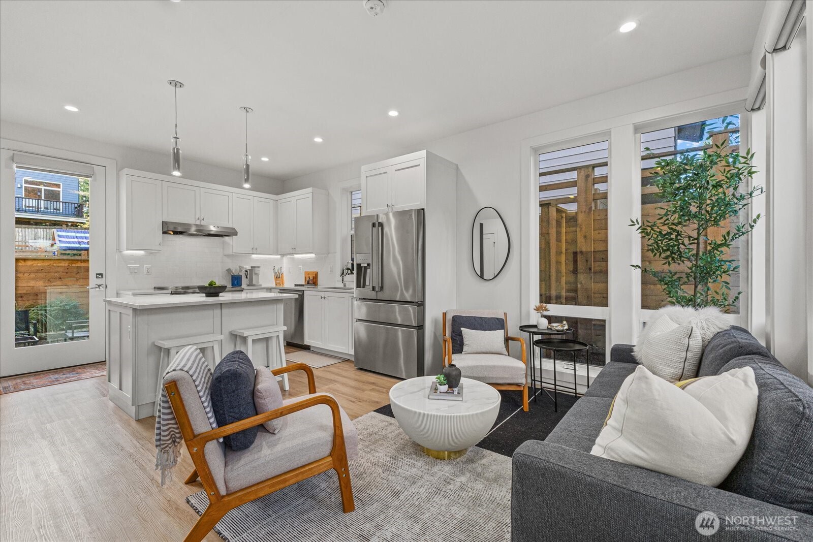3537 Northeast 93rd Street Seattle, WA 98115 - Photo 2 of 22 a living room with fireplace furniture and a wooden floor
