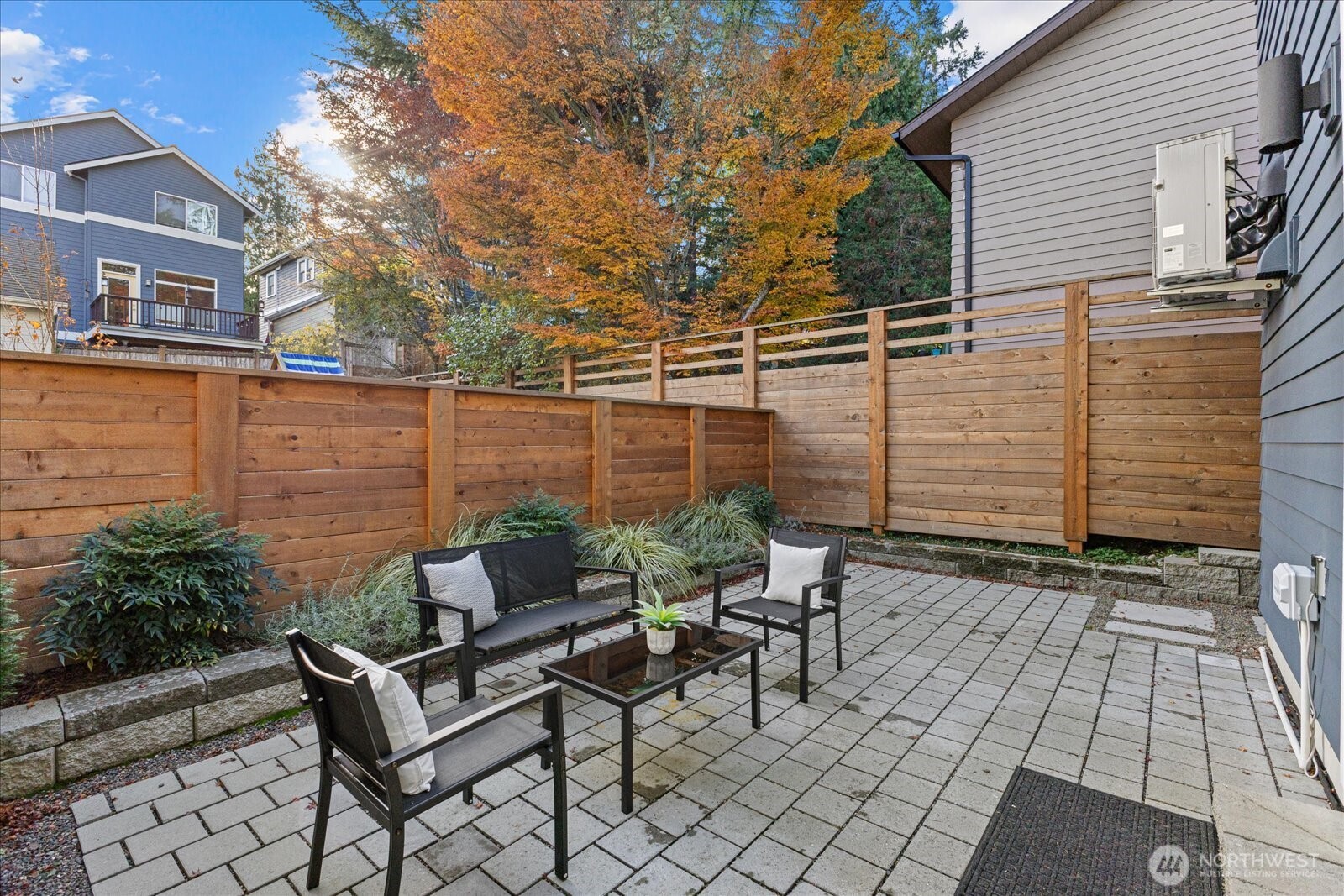 3537 Northeast 93rd Street Seattle, WA 98115 - Photo 9 of 22 a view of a chairs and table on the terrace
