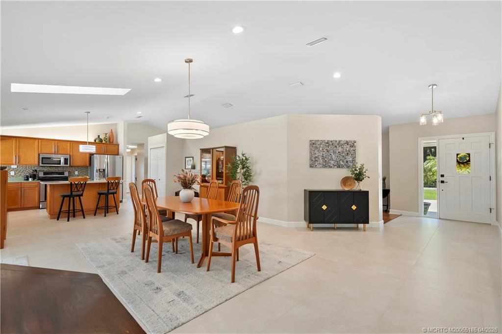 4620 Southeast Quail Trail Stuart, FL 34997 - Photo 11 of 71 a view of a dining room with furniture