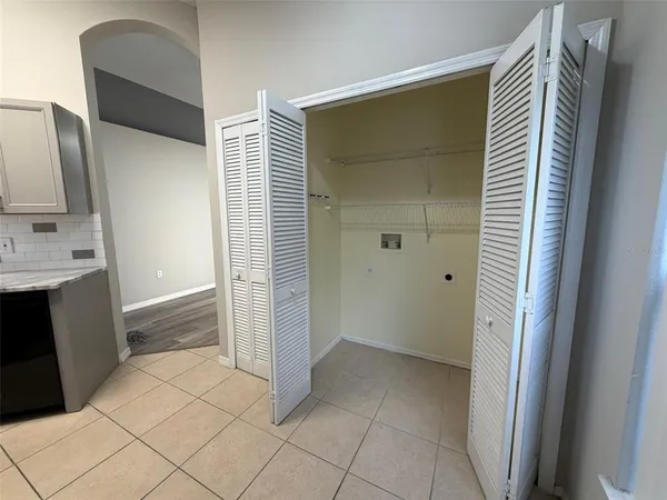 a bathroom with a sink a mirror and a shower