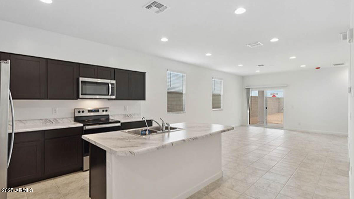 8317 West Banks Court Florence, AZ 85132 - Photo 3 of 32 02_Kitchen