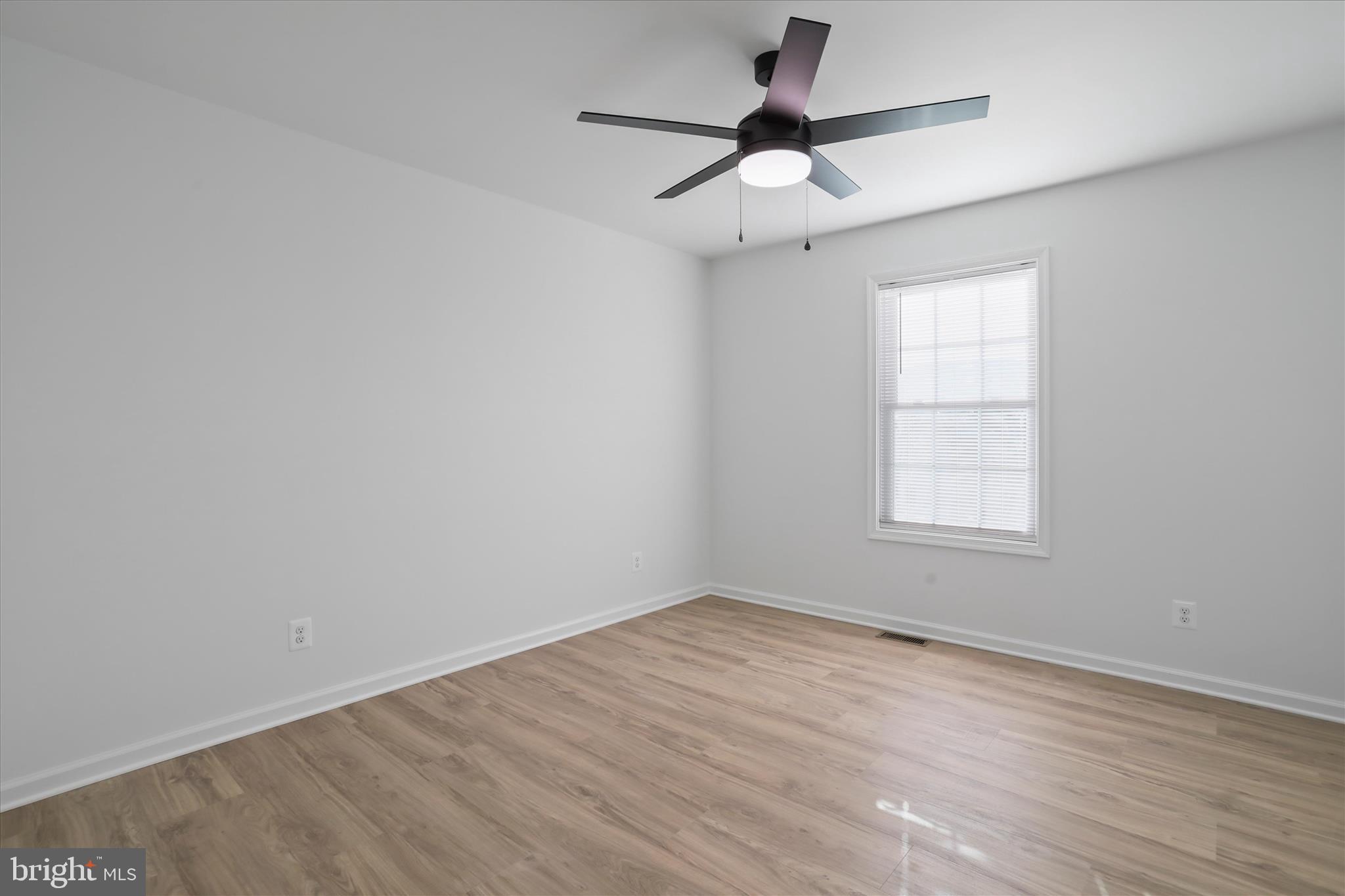 118 Windsor Knit Road Edinburg, VA 22824 - Photo 22 of 34 an empty room with a window and a fan