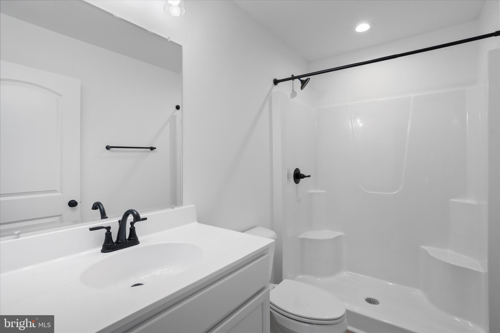 118 Windsor Knit Road Edinburg, VA 22824 - Photo 29 of 34 a bathroom with a sink toilet and shower