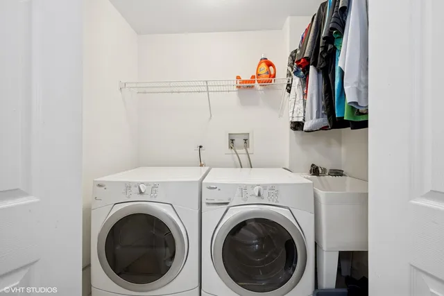 a utility room with dryer and washer