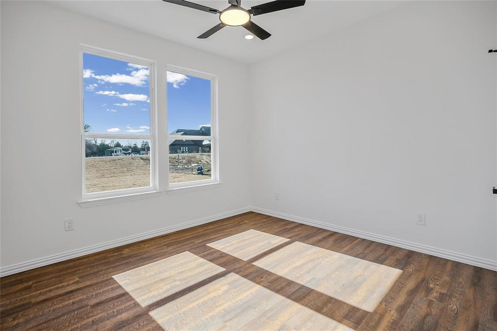 3093 Willow Road Celeste, TX 75423 - Photo 32 of 40 a view of an empty room with a window