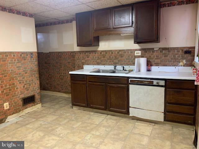 8550 Oakleigh Road Baltimore, MD 21234 - Photo 8 of 26 a kitchen with stainless steel appliances granite countertop a sink stove and cabinets