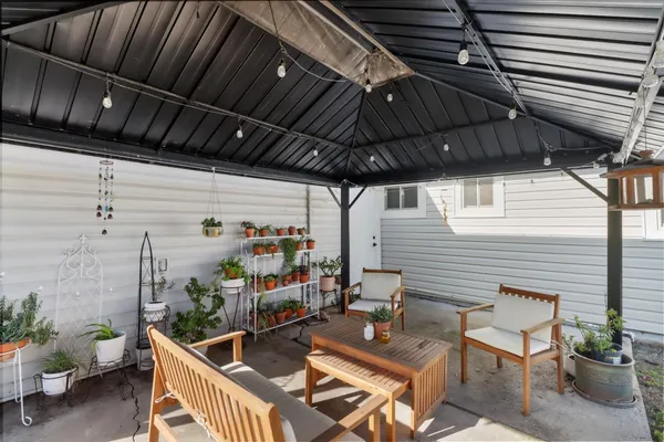 a view of a back yard of the house