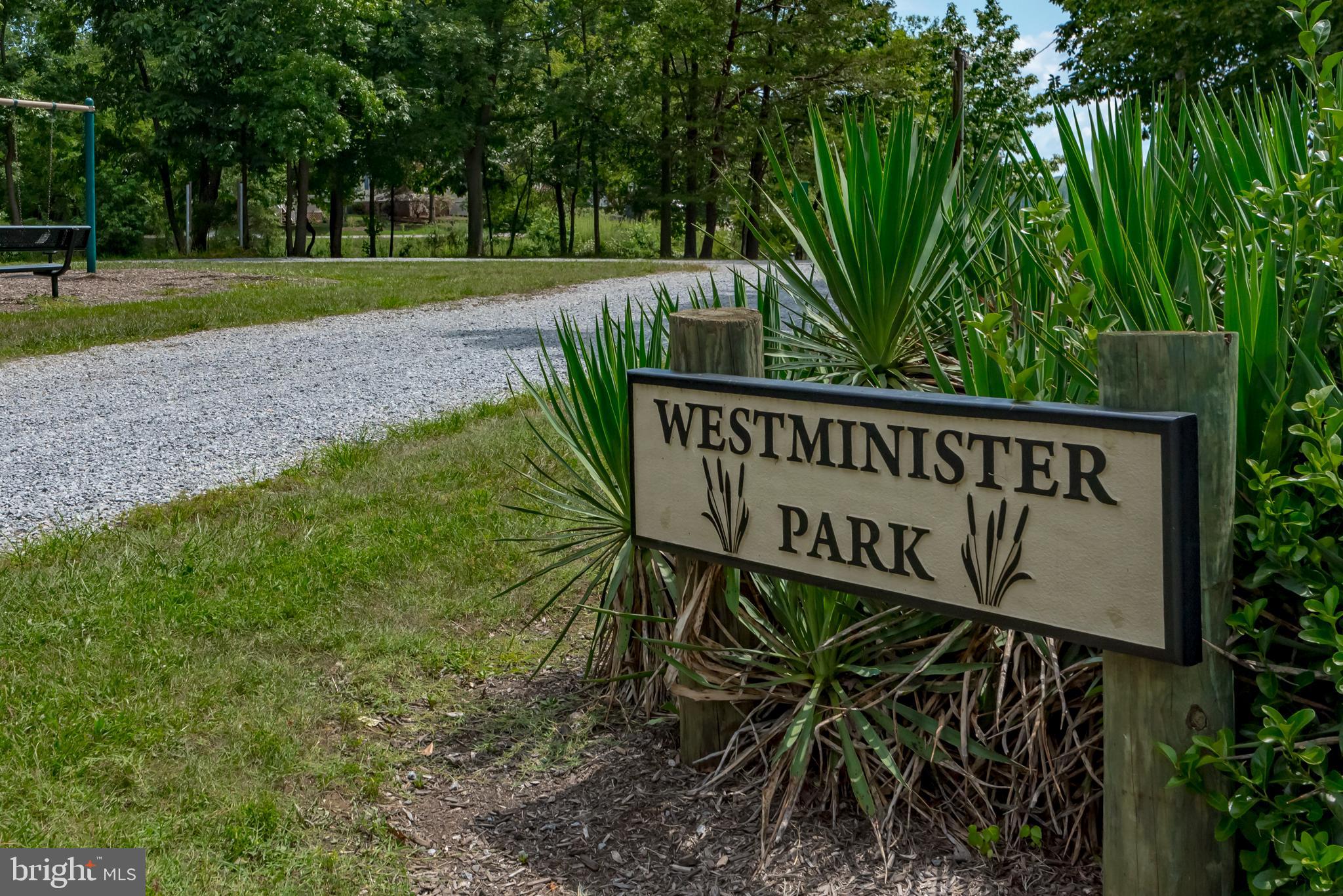 1505 Grange Road Edgewater, MD 21037 - Photo 12 of 45 a view of a street sign under a large tree