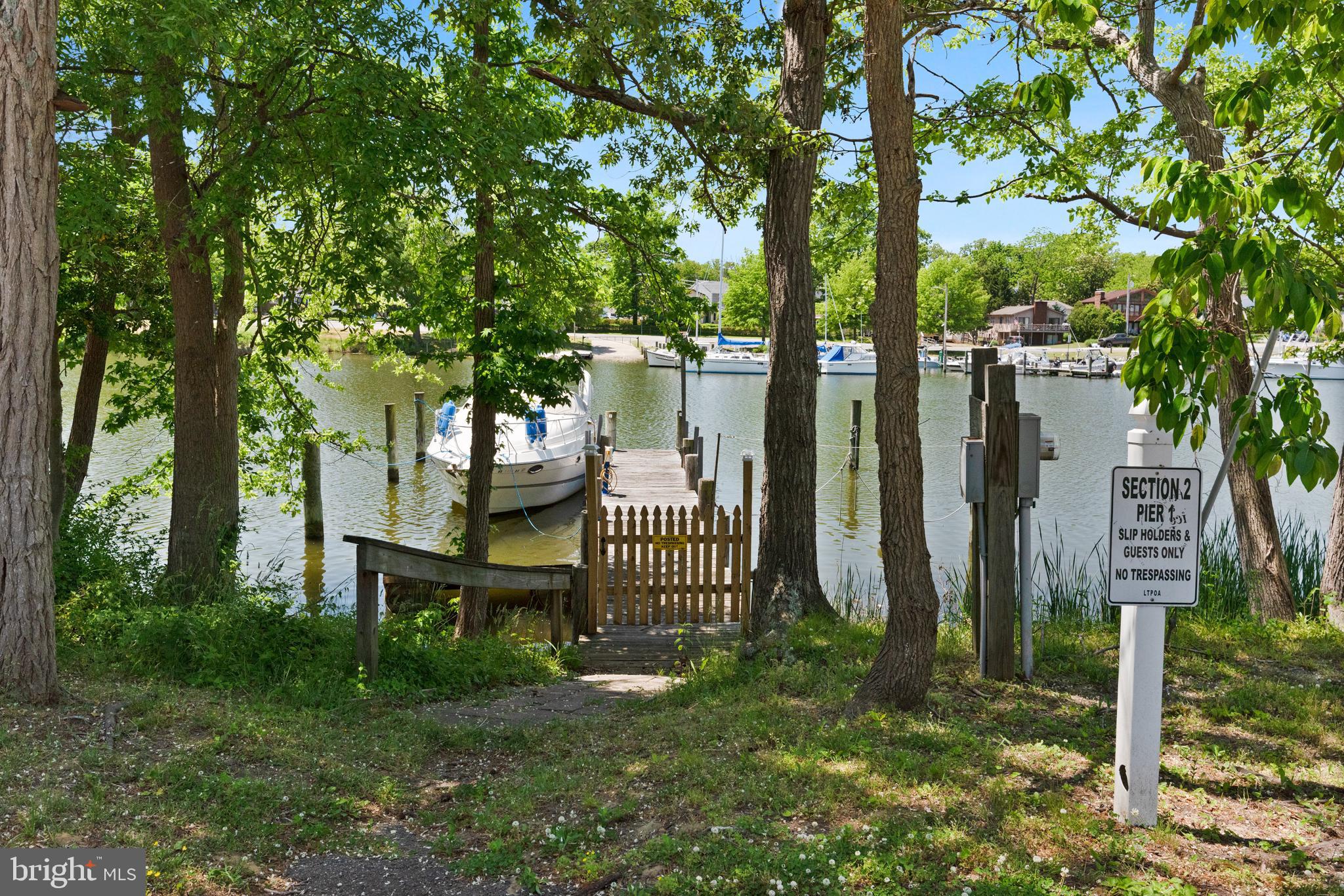 1505 Grange Road Edgewater, MD 21037 - Photo 14 of 45 a view of a bench in the garden