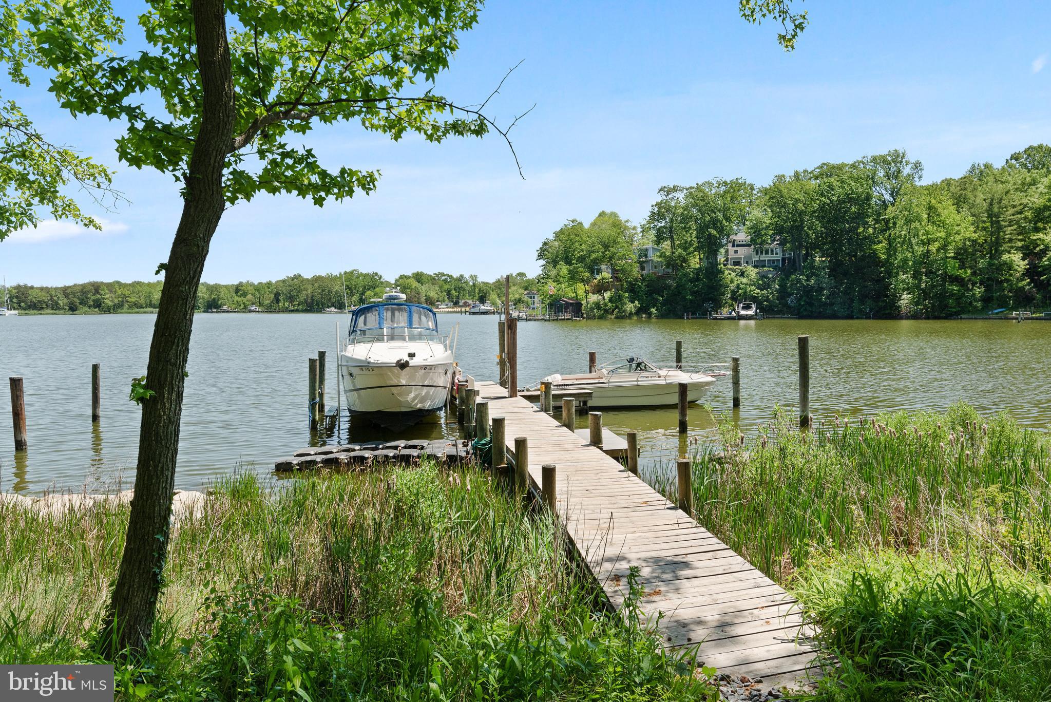 1505 Grange Road Edgewater, MD 21037 - Photo 16 of 45 a balcony with wooden floor and lake view