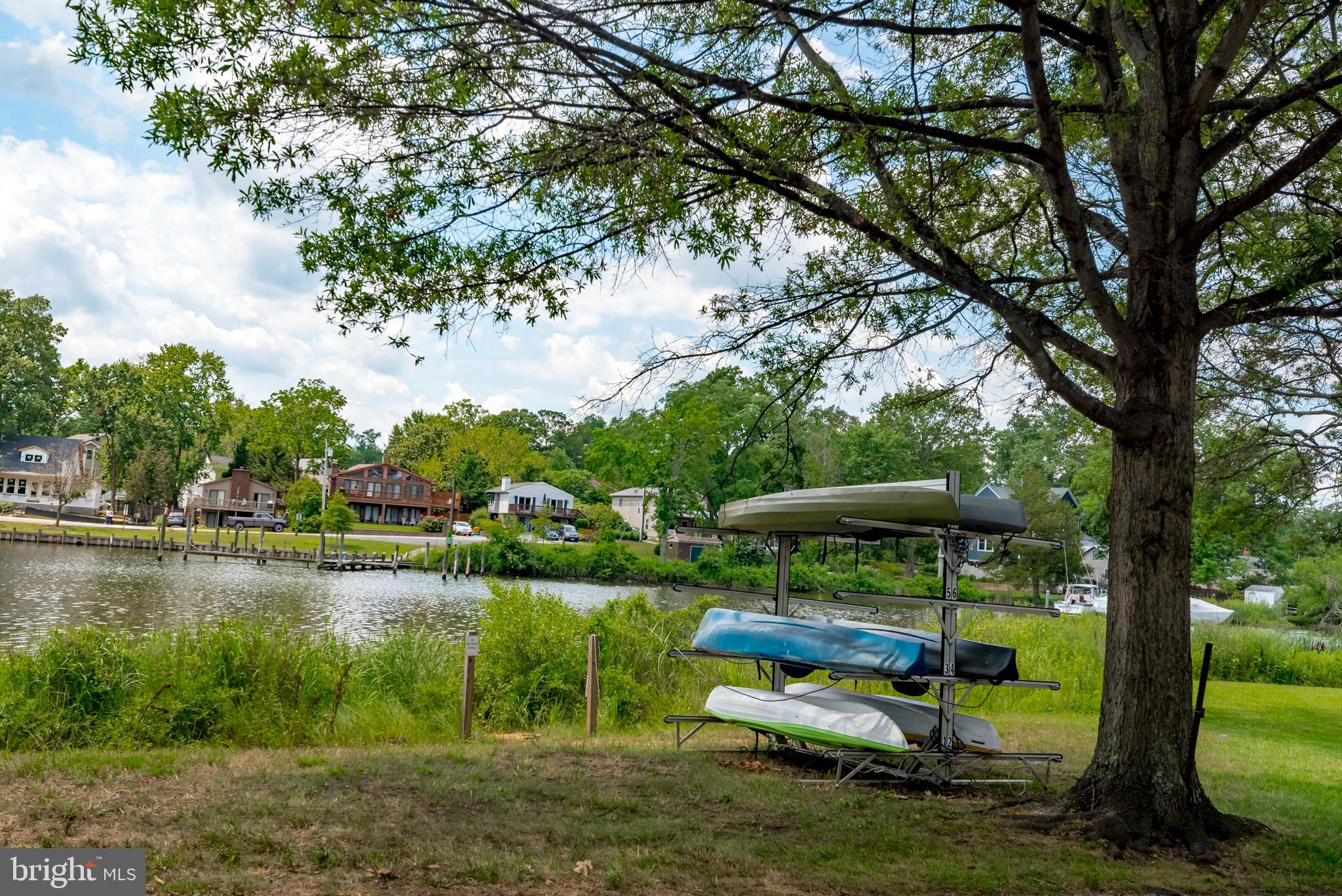 1505 Grange Road Edgewater, MD 21037 - Photo 19 of 45 a view of a lake with a yard