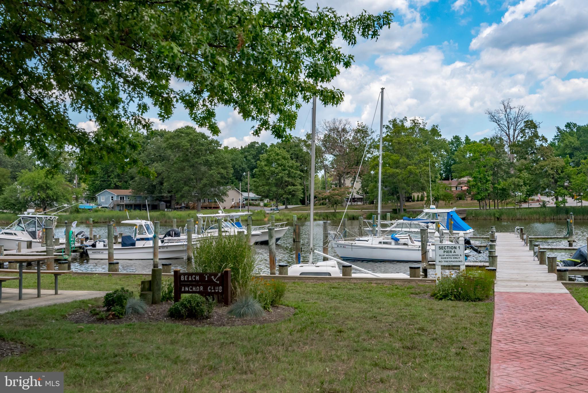 1505 Grange Road Edgewater, MD 21037 - Photo 32 of 45 a view of house with outdoor seating and lake