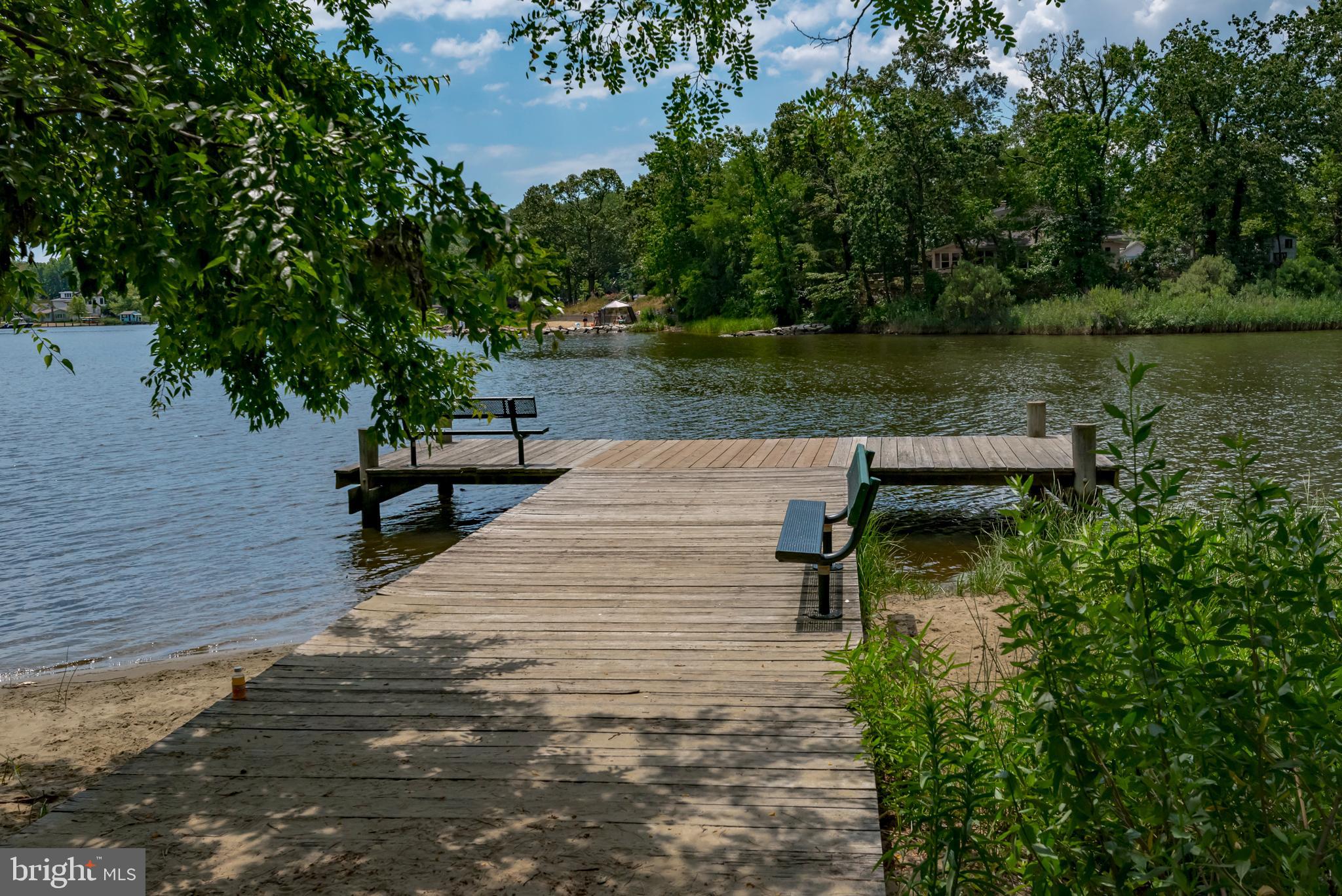 1505 Grange Road Edgewater, MD 21037 - Photo 37 of 45 a view of a lake with chairs