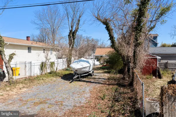 a view of a back yard of the house