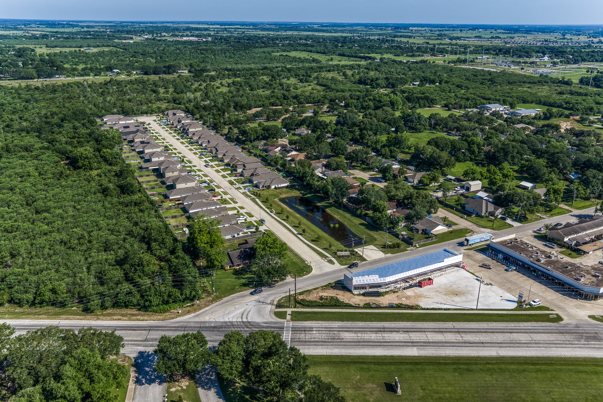 1687 Eagle Lake Road Sealy, TX 77474 - Photo 3 of 27 an aerial view of a house with a yard